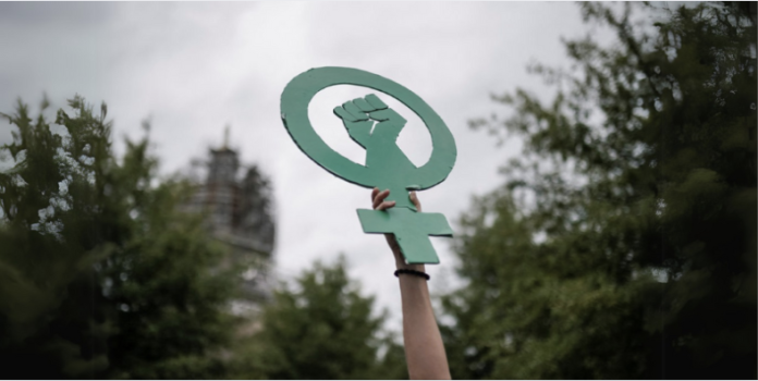 An attendee holds a symbol of women's rights during a vigil and rally for abortion rights and in response to the deaths of Amber Nicole Thurman and Candi Miller, who died of complications during pregnancy, in Atlanta, Georgia, Sept. 28, 2024. File photo by Elijah Nouvelage/Reuters